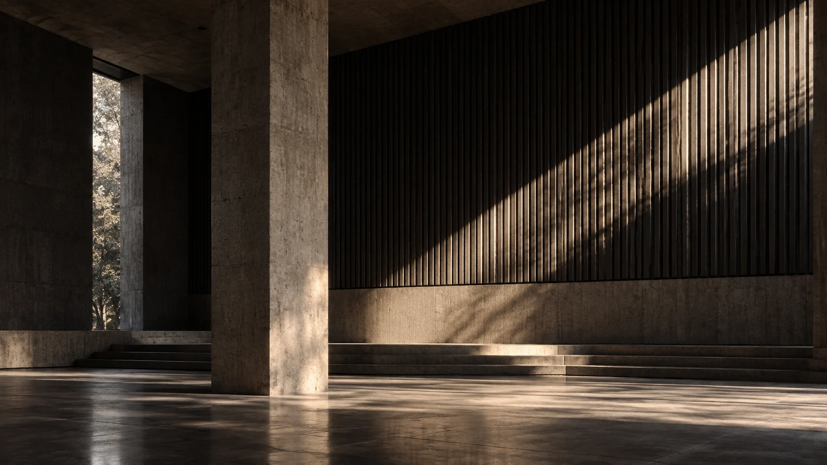 Espacio arquitectónico vacío con luz cayendo sobre un muro acústico